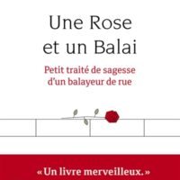 Une rose et un balai